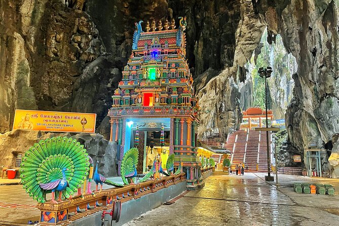 Batu Caves Twilight and Little India Evening Tour - Climbing the rainbow steps at Batu Caves