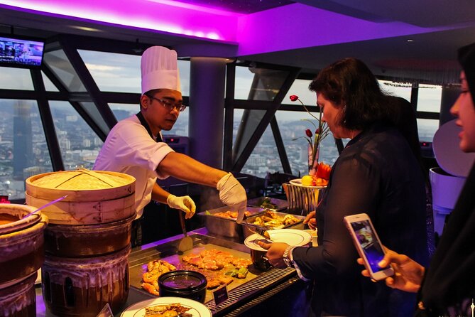 Dining at ORBIT Revolving Restaurant KL Tower with Transfers - Two hours of views, food, and music