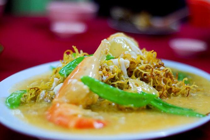 Eat Like a Local: Kuala Lumpur Hawker Center and Street Food Tour by Night - Malay food: nasi lemak, satay, and curry