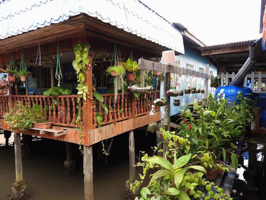 From Sandakan: 7 Unmissable Local Stops Private Tour - Seeing the sea village from the waterfront