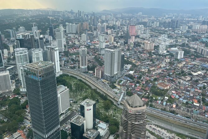 Kuala Lumpur City Tour with Petronas Twin Tower Admission Ticket - Central Market and the River of Life