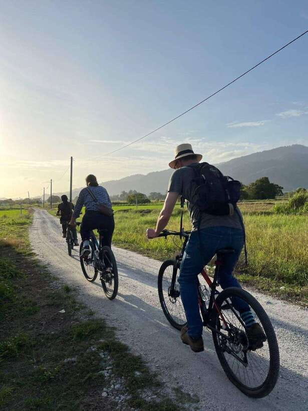 Langkawi: Countryside Bike Tour, Waterfall Swim & Dessert - The first 90 minutes: village roads and local life