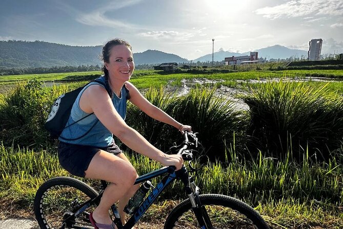 Private Half Day Cycling Tour in Langkawi - Fresh market, local food, and a batik surprise