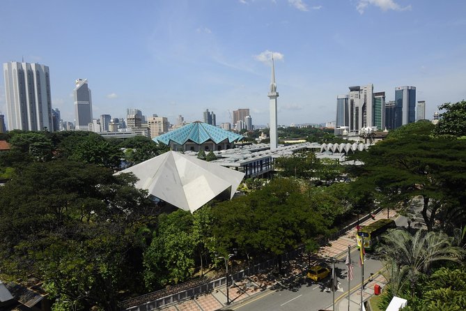 Private Half-Day Kuala Lumpur Culture And Communities Exploration Tour - Chinatown for food stalls and local favorites