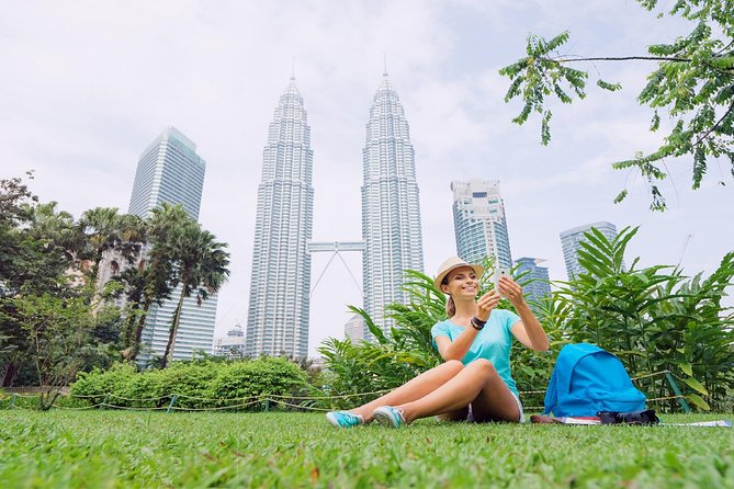 Private Kuala Lumpur Photographic Tour With Petronas Towers & Sky Box K.L Tower - National Mosque, a blue and green focal point