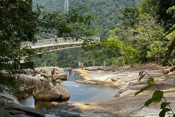 Telaga Tujuh Waterfall Half Day and Sacred Blue Pool Tour - A drink at the car park